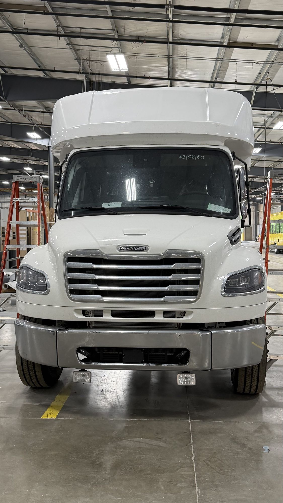 HLE Stratos bus on the Freightliner S2C chassis, front view in the plant