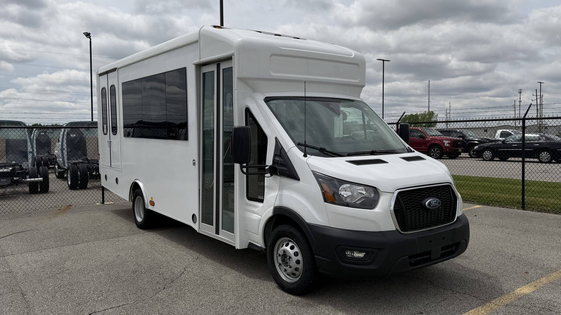 HLE Strykr shuttle bus on the Ford Transit chassis, exterior front three-quarter view